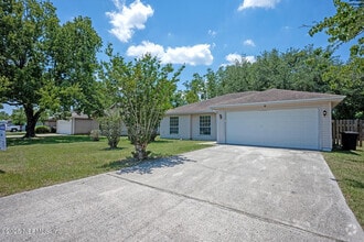 Building Photo - 7728 Pikes Peak Dr