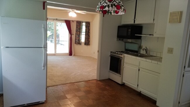 kitchen with view into bedroom - 16845 Armstead St