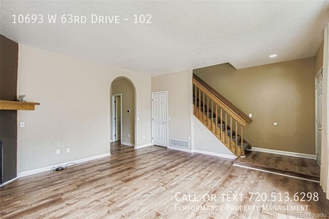 Building Photo - 10693 W 63rd Dr