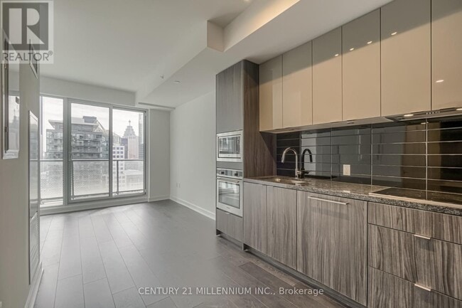Building Photo - 115-3115 Blue Jays Way