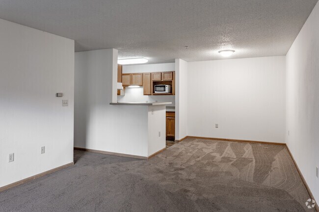 2 habitaciones, 1 baño - 800 pies cuadrados - Sala de estar - Swisshelm Village Apartments