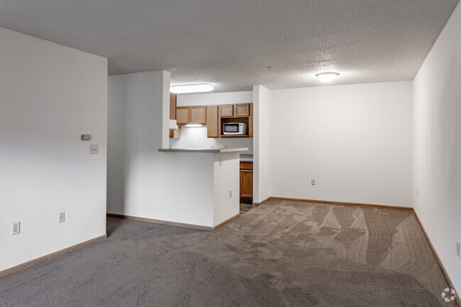 2BR, 1BA - 800SF - Living Room - Swisshelm Village Apartments
