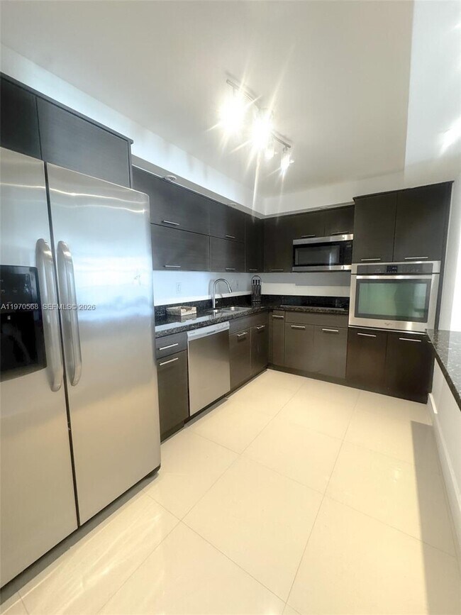 Building Photo - 19390 Collins Ave