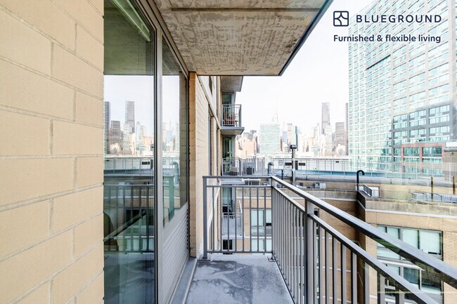 Building Photo - 4-75-75 48th Ave