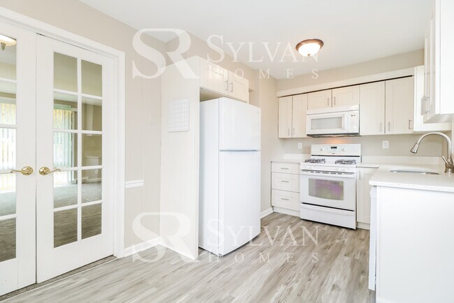 Building Photo - Enjoy living the good life in this 4 bedro...