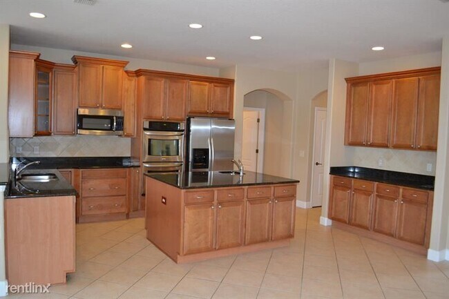 Building Photo - 4 br, 3 bath House - 1042 Spinning Wheel Dr