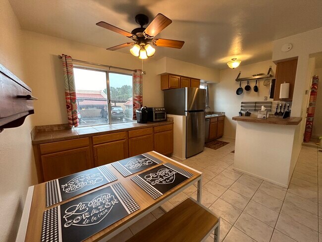 Kitchen and dining area - 2552 N Sahuara Ave