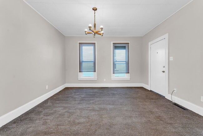 Building Photo - Charming Home with Updates and Covered Por...