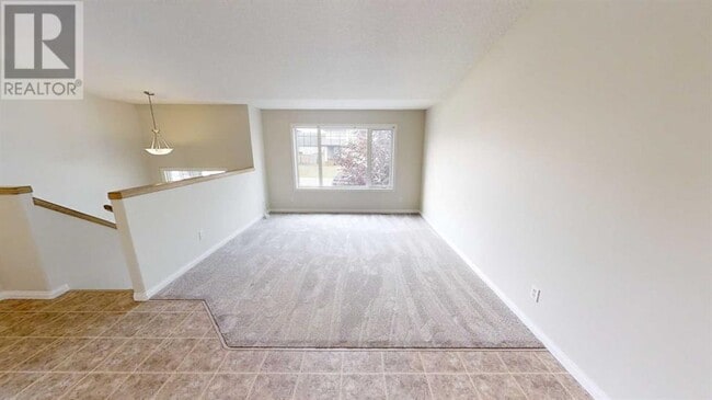 Building Photo - 9129-9131 131 Ave