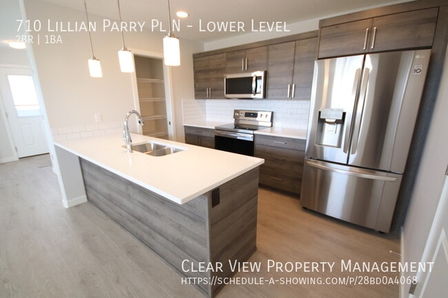 Photo du bâtiment - Amazing 2-bedroom 1-bathroom basement suit...
