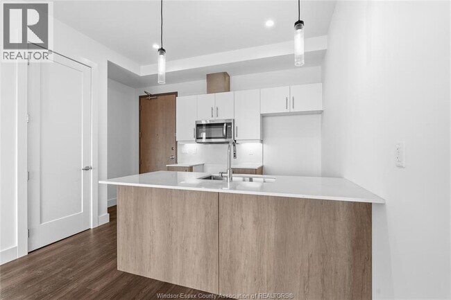 Photo du bâtiment - 595 LILYMAC Unit# 102