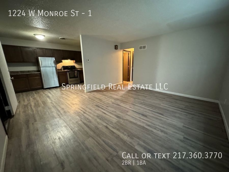 Primary Photo - Down-to-Earth Elegance: Charming 2 Bed, 1 ...