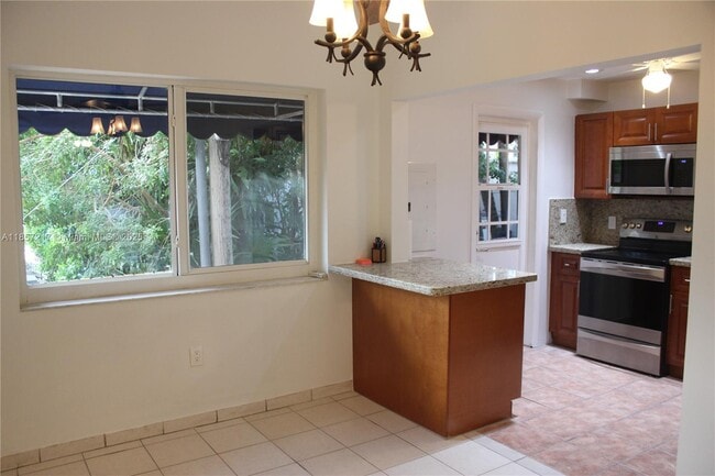 Building Photo - 8958 Collins Ave