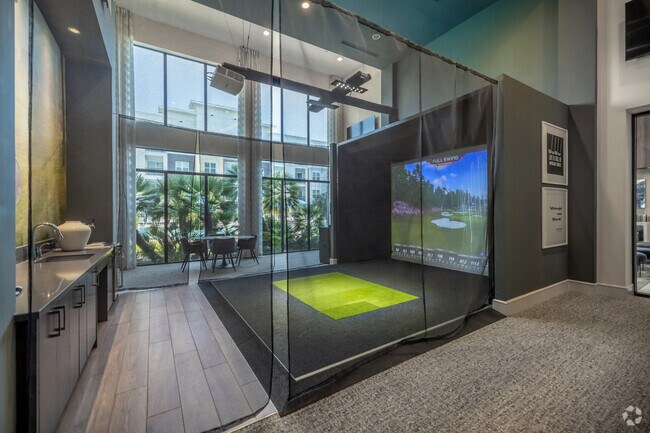 Sala de juegos con simulador de golf - Domain Heights