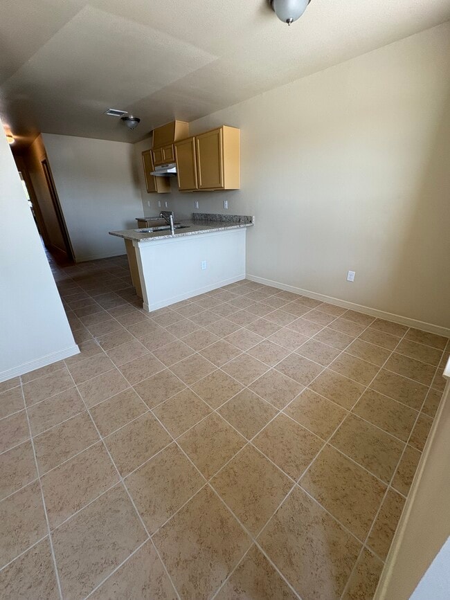 Dining area w Kitchen - 8519 Wells Rd