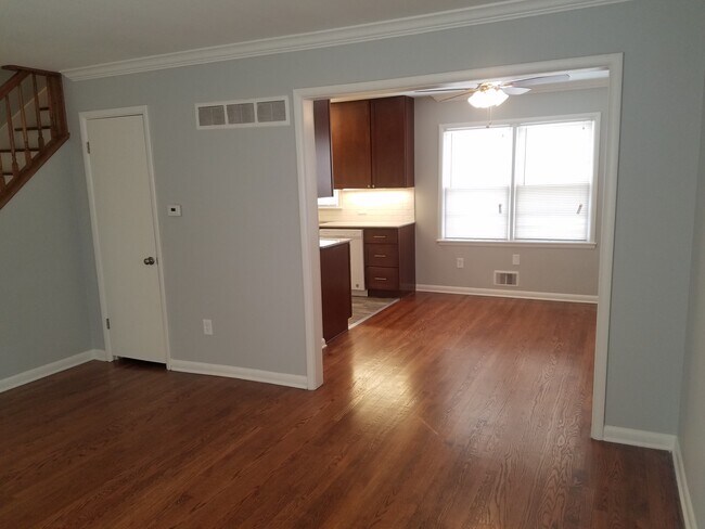 Living room looking into dining room. - 6617 Walrond Ave