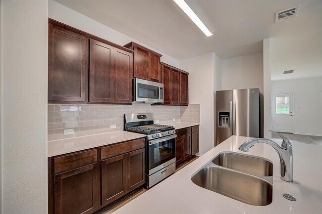 Foto del edificio - 8008 Copper Prairie Bend