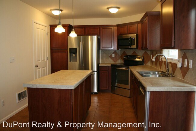 Building Photo - 3 br, 2.5 bath House - 5004 Roxanna Court ...