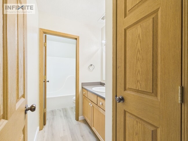 Building Photo - Spacious 2 Bedroom, 2 Bath Condo w/ Detached Garage – Move-In Ready!