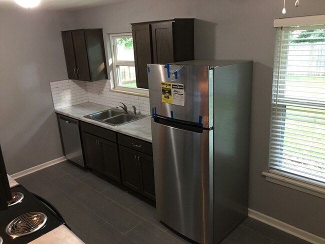 Refrigerator-side sink and cabinets - 230 Middlebury Dr.