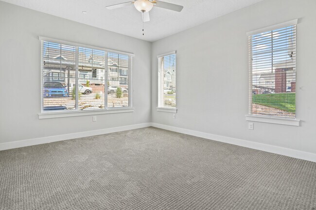 Primary bedroom with tons of natural light - Meadows at American Fork