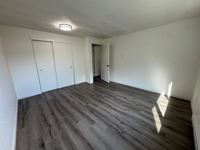 Building Photo - Make this beautiful light filled condo your home!