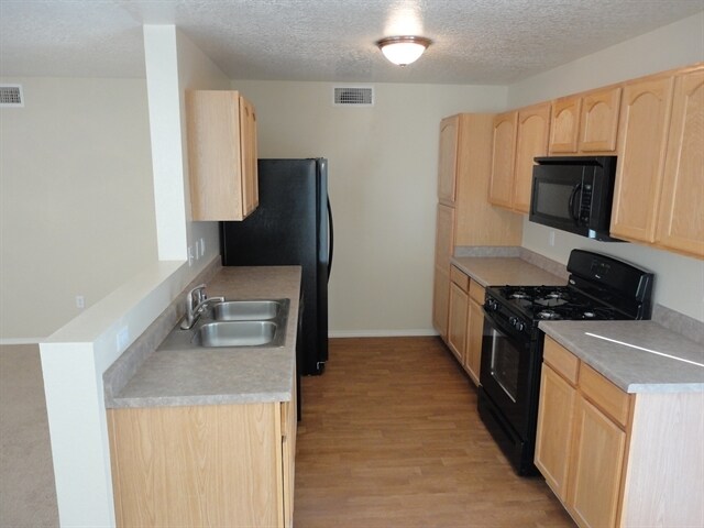 Building Photo - 3752 Rancher Loop NE