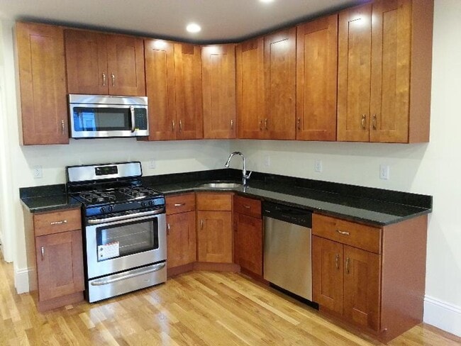 Building Photo - Three bedroom + three bathroom in Allston