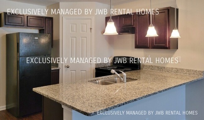 Building Photo - 8415 McGirts Village Ln