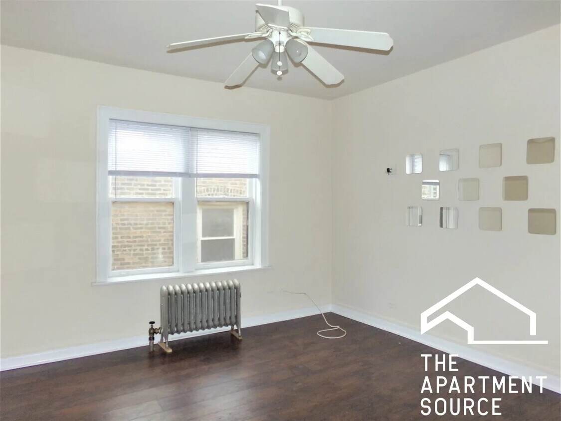 Foto del edificio - 6916 N Lakewood Ave