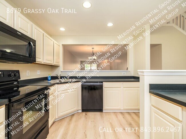 Foto del edificio - 8679 Grassy Oak Trail