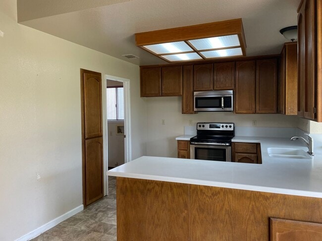 Building Photo - Separate Family Room and Living Room, Fireplace, RV Access