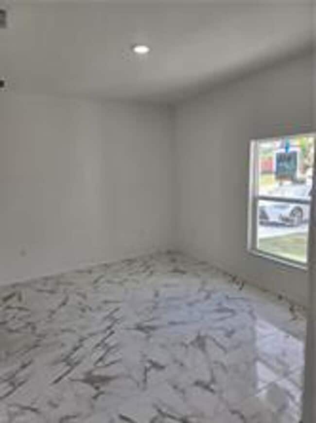 Building Photo - NEW CONTRUCTION 2/2/1- MOVE IN READY