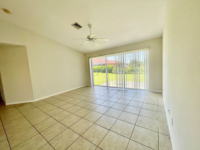 Building Photo - Lehigh Acres 3 Bedroom, 2 Bath, 2 Car Gara...
