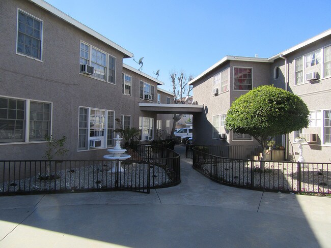 Building Photo - 9651 Woodman Ave