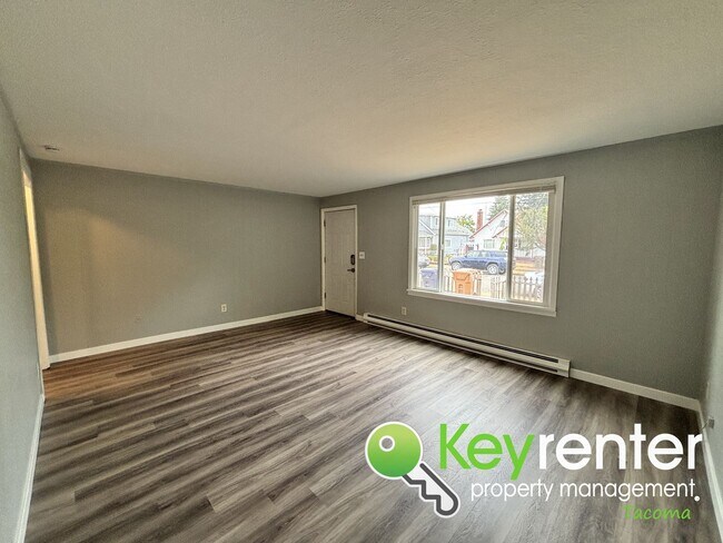 Foto del edificio - 4 Bedroom 2 Bathroom Tacoma Rental with Ga...