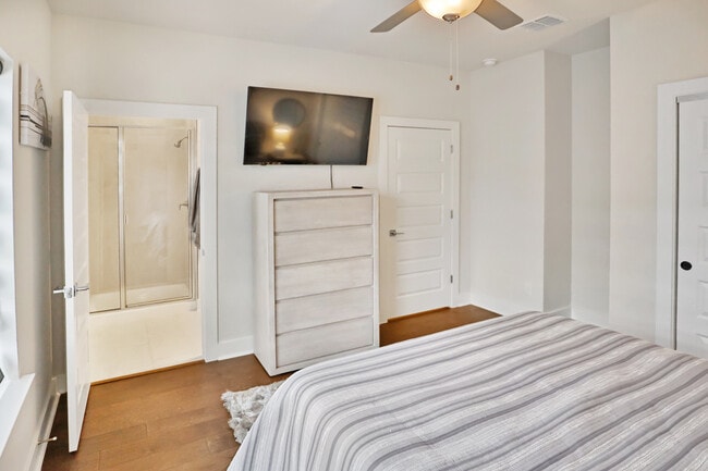 Bedroom 2 features en suite bathroom and 55 in TV - 411 Ira Ave