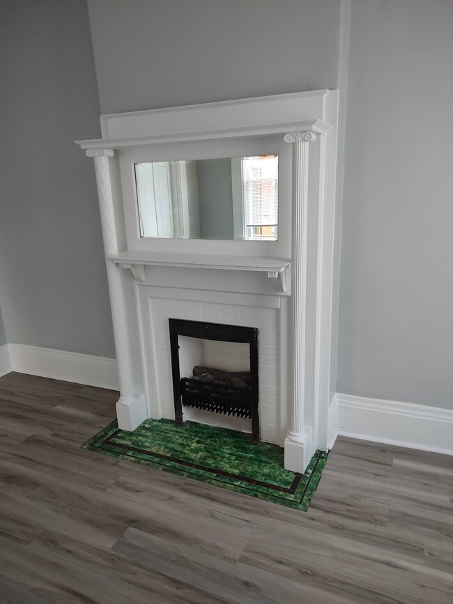 Original Fireplace. Rookwood pottery tile - 1024 Columbia St House