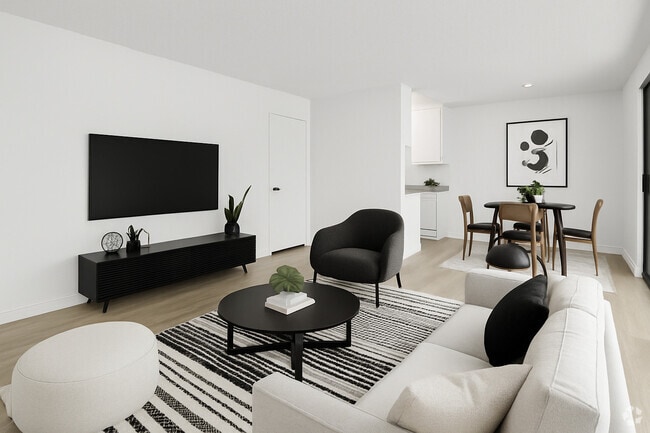 Building Photo - Spacious & Sunny 1, 2, and 3-bedroom apart...
