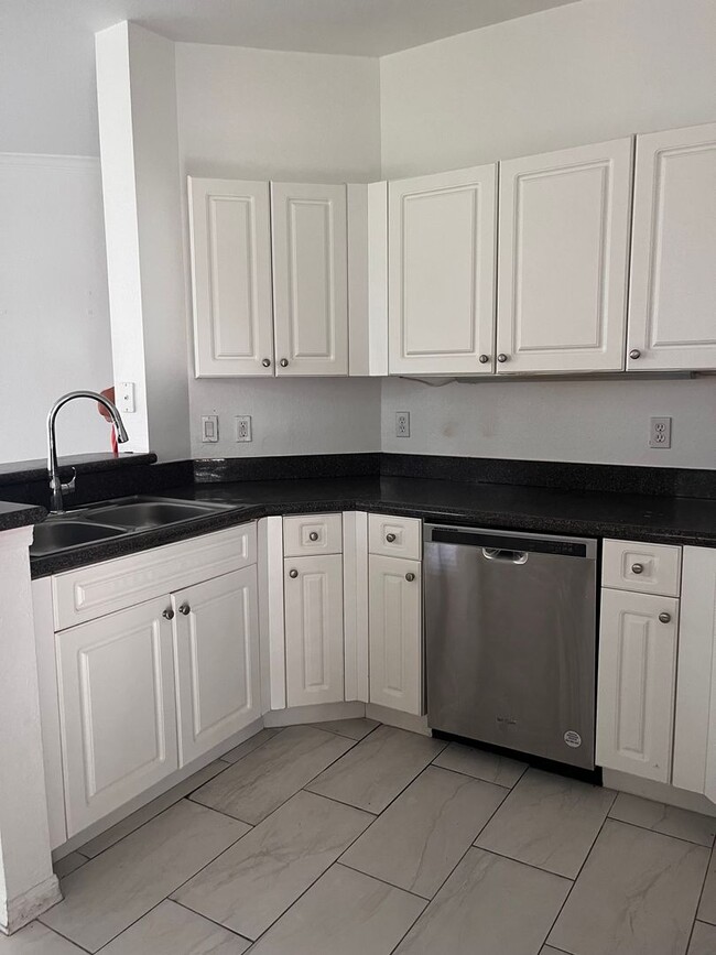 Building Photo - COMING SOON! Space, Style & Serenity! Enjoy comfortable living in this beautiful 4-bedroom home f...