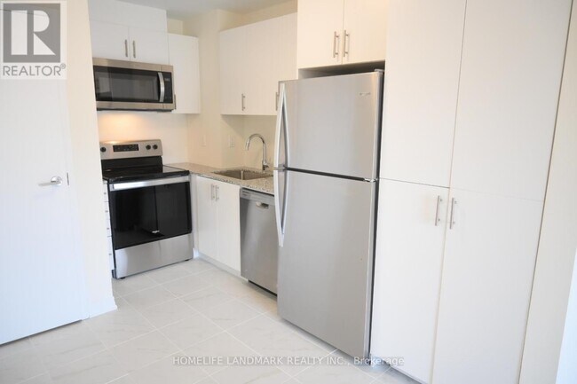 Photo du bâtiment - 235 McLevin Ave