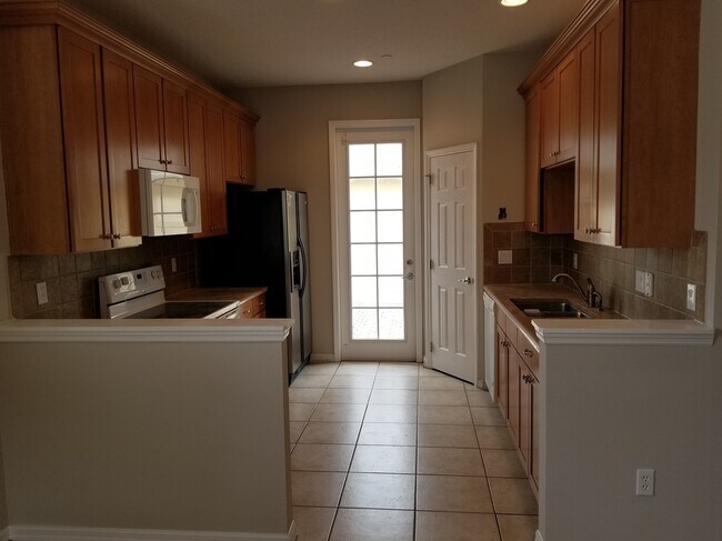 Foto del edificio - Morningside at Lake Nona End Unit Townhome with Two Car Garage