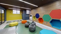 This dynamic single-floor space is thoughtfully designed to serve both recreational and fitness purposes, combining energetic aesthetics with functional layouts. The main play and lounge area is immediately eye-catching, featuring a green rubberized floor surface that defines the active zone. Colorful hexagonal ottomans in yellow, orange, teal, and blue are scattered throughout, providing flexible, informal seating alongside oversized gray bean bag chairs. A wood-paneled accent wall hosts bold hexagonal shelving units in navy, orange, green, and yellow, adding both storage and a striking visual element. A mounted flat-screen television anchors a bright yellow feature wall, accompanied by abstract artwork and a low white media console. A small activity table with industrial-style chairs offers a structured work or play surface, while floor-based learning games add an educational element. A basketball hoop is integrated into one corner. The ceiling features linear LED lighting set against warm wood slat panels, creating a modern yet inviting atmosphere. Large black-framed glass sliding doors connect seamlessly to an adjacent fitness center, which is fully equipped with cardio machines and exercise equipment, visible through the transparent partition.