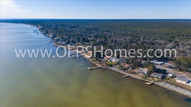 Building Photo - Stunning 4-Bedroom, 3-Bath Waterfront Home in Choctaw Beach – 140ft of Bayfront Bliss!