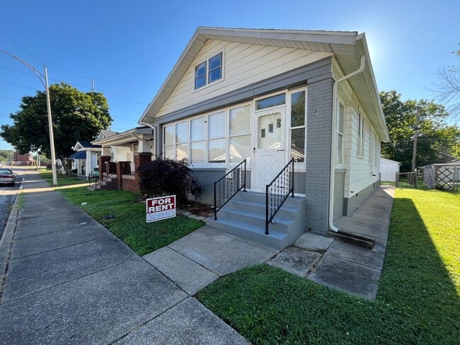 Building Photo - 1110 S Harlan Ave