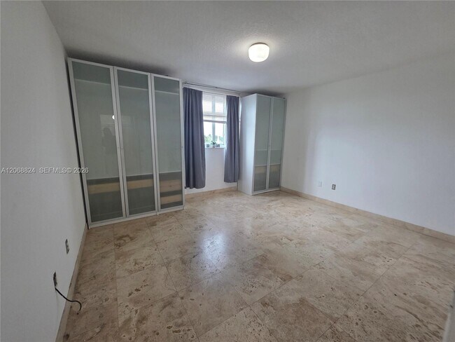 Building Photo - 8888 Collins Ave