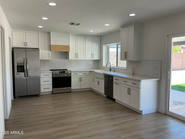 Foto del edificio - 5038 E Winchcomb Dr