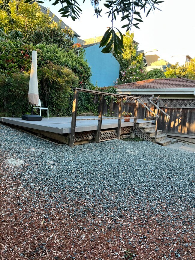 Backyard with deck - 710 Walavista Ave