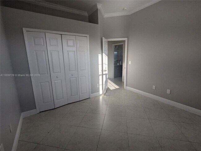 Building Photo - Northwest 91st Court, Hialeah Gardens, FL 33018 - 3 BR 1 BA single-family home