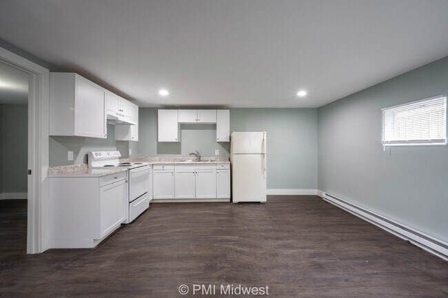 Foto del edificio - Charming 1-Bedroom Duplex with Modern Amen...